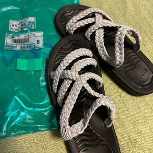 New. Never wore. No tags. Original packaging. Size 8.